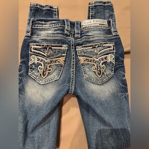 Rock Revival size 24 mid-rise skinny Jeans